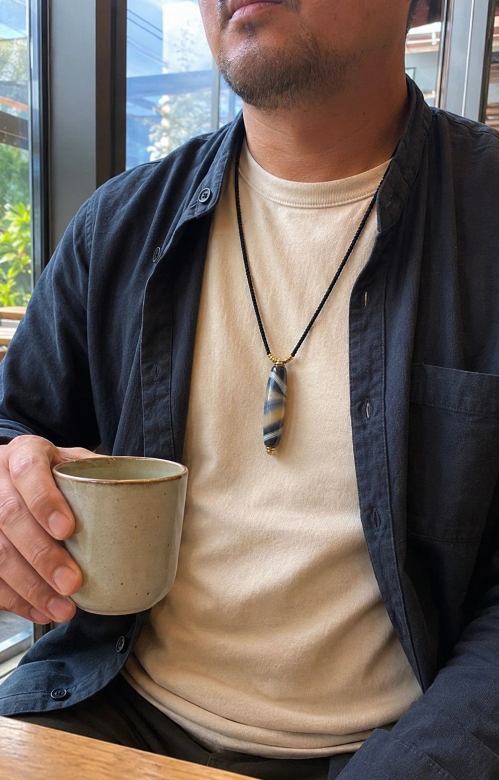 Jade pendant worn in daily life