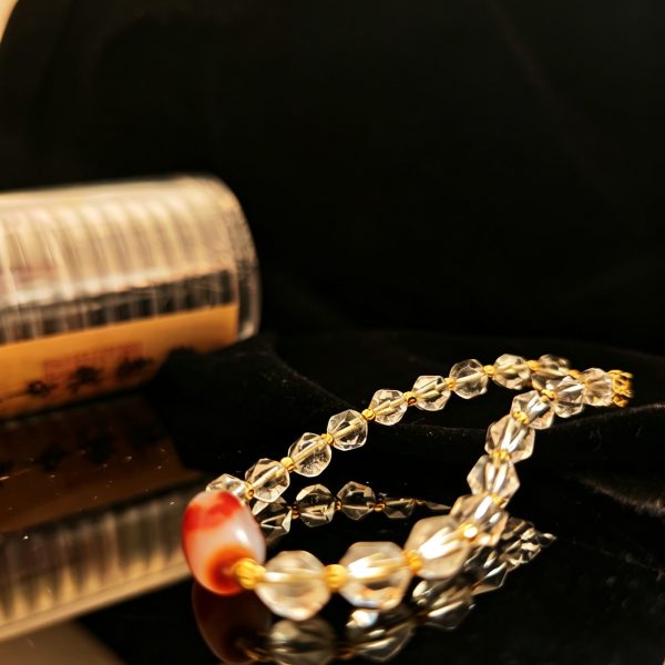 Red Flesh Tiger Tooth & Faceted Clear Quartz Bracelet